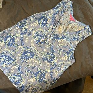 Like new Lilly tank top in blue floral pattern.